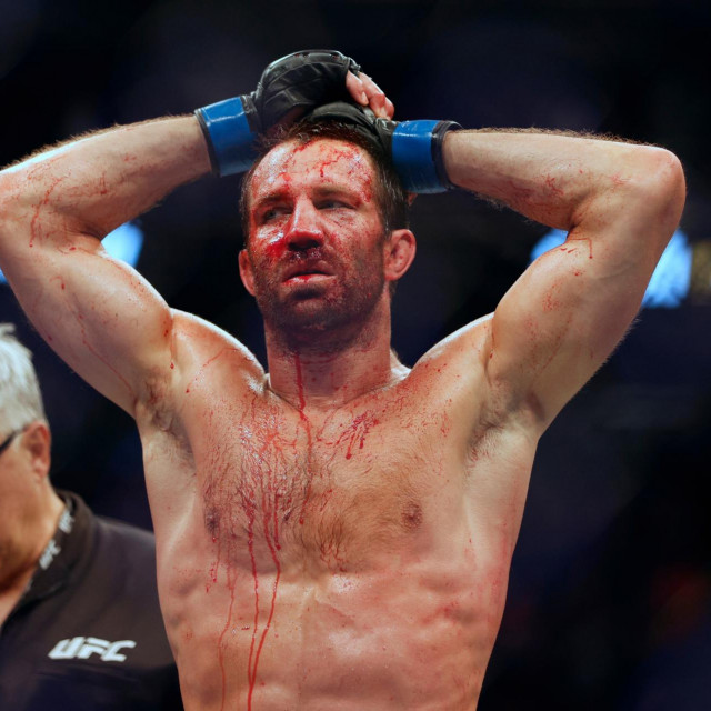 Aug 20, 2022; Salt Lake City, Utah, USA; Luke Rockhold (blue gloves) reacts after being defeated by Paulo Costa (red gloves) during UFC 278 at Vivint Arena.,Image: 715505460, License: Rights-managed, Restrictions: *** World Rights ***, Model Release: no, Credit line: USA TODAY Network/ddp USA/Profimedia