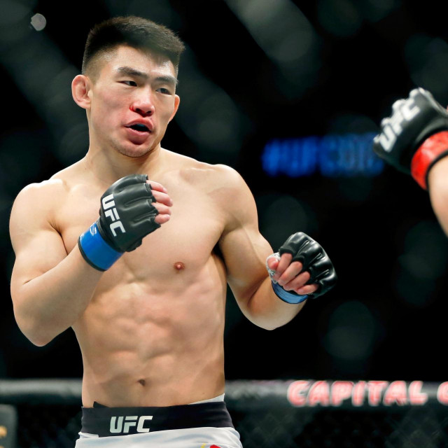 Dec 7, 2019; Washington, DC, USA; Cody Stamann (red gloves) fights Song Yadong (blue gloves) during UFC Fight Night at Capital One Arena.,Image: 486938508, License: Rights-managed, Restrictions: *** World Rights ***, Model Release: no, Credit line: USA TODAY Network/ddp USA/Profimedia