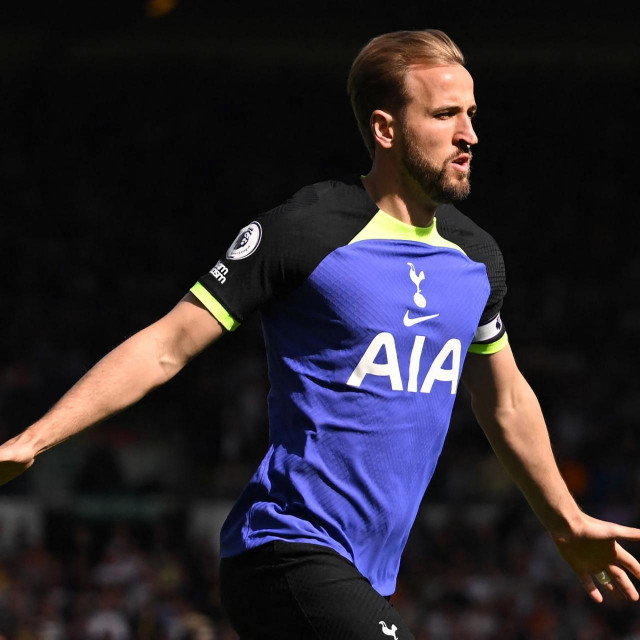 Tottenham Hotspur‘s English striker Harry Kane celebrates after scoring the opening goal during the English Premier League football match between Leeds United and Tottenham Hotspur at Elland Road in Leeds, northern England on May 28, 2023. (Photo by Oli SCARFF/AFP)/RESTRICTED TO EDITORIAL USE. No use with unauthorized audio, video, data, fixture lists, club/league logos or ‘live‘ services. Online in-match use limited to 120 images. An additional 40 images may be used in extra time. No video emulation. Social media in-match use limited to 120 images. An additional 40 images may be used in extra time. No use in betting publications, games or single club/league/player publications./