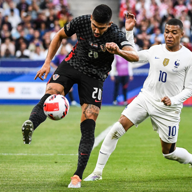 Martin Erlić i Kylian Mbappe
