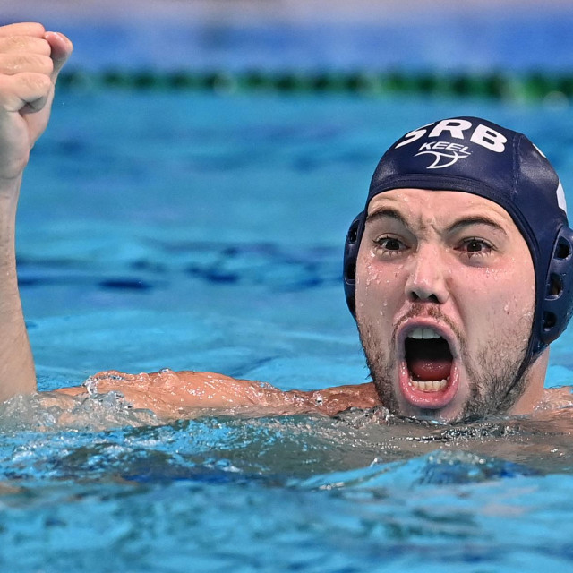 Serbia‘s Dusan Mandic reacts during the Tokyo 2020 Olympic Games men‘s water polo quarter-final match between Italy and Serbia at the Tatsumi Water Polo Centre in Tokyo on August 4, 2021. (Photo by Angela WEISS/AFP)