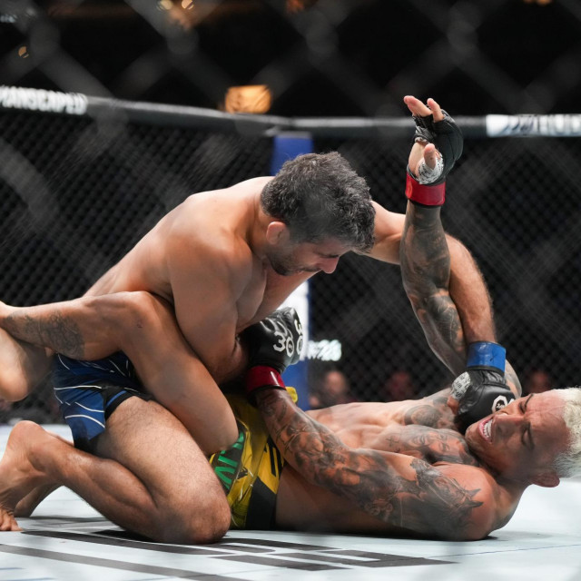 Charles Oliveira, bottom right, and Beneil Dariush fight during a UFC 289 lightweight bout, in Vancouver, on Saturday, June 10, 2023.,Image: 782713271, License: Rights-managed, Restrictions: World rights excluding North America, Model Release: no, Credit line: DARRYL DYCK/PA Images/Profimedia