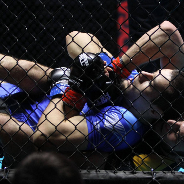 14.02.2023 BelgradeSerbia IMMAF World Championships Seniors Men WELTERWEIGHT 77.1 KG 1/4 final Omar Tugarev above Finland,RAMAZAN GITINOV down Bahrein:,Image: 756048820, License: Rights-managed, Restrictions:, Model Release: no, Credit line: IMAGO/imago sportfotodienst/Profimedia
