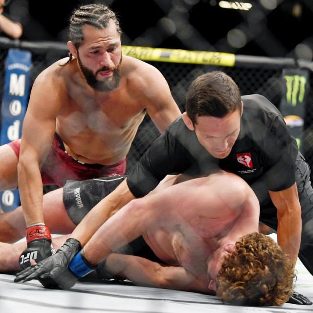 Jul 6, 2019; Las Vegas, NV, USA; Jorge Masvidal (red gloves) punches Ben Askren (blue gloves) as referee Jason Herzog stops the fight at T-Mobile Arena. Jorge Masvidal set a new record for the fastest knockout in UFC history with five seconds.,Image: 455070513, License: Rights-managed, Restrictions: *** World Rights ***, Model Release: no, Credit line: USA TODAY Network/ddp USA/Profimedia