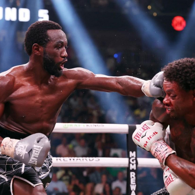 Terrence Crawford punches Errol Spence Jr.