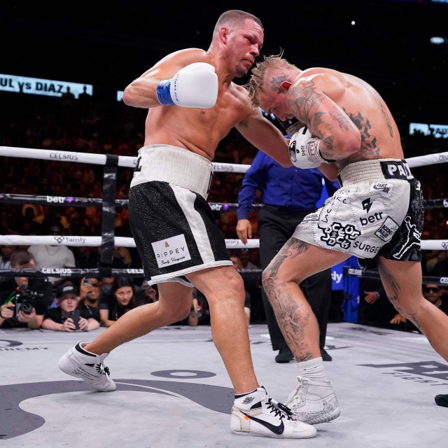 DALLAS, TEXAS - AUGUST 05: Nate Diaz throws a left at Jake Paul during the tenth round of their fight at the American Airlines Center on August 05, 2023 in Dallas, Texas. Sam Hodde/Getty Images/AFP (Photo by Sam Hodde/GETTY IMAGES NORTH AMERICA/Getty Images via AFP)