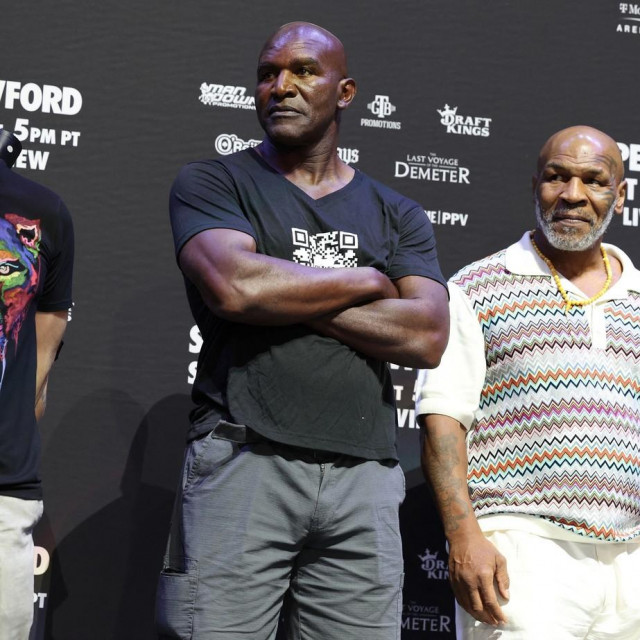 Evander Holyfield (lijevo) i Mike Tyson (desno)