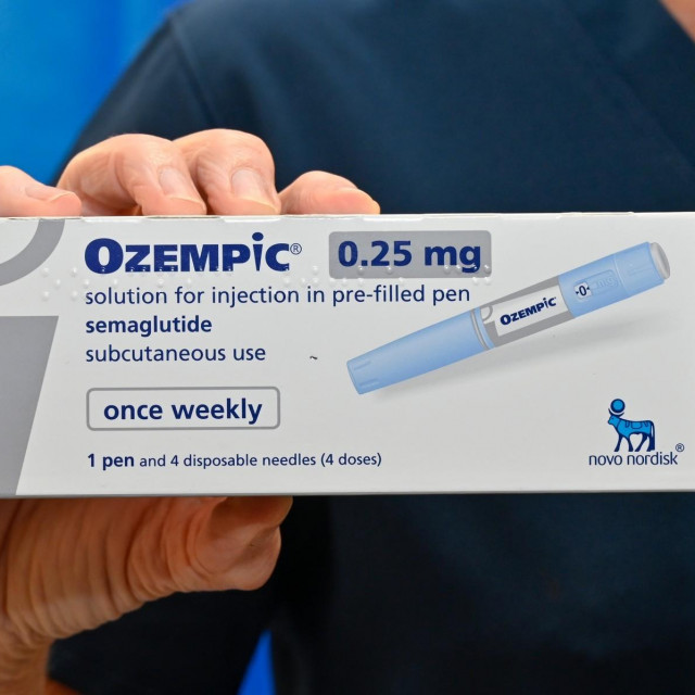 Editorial use only
Patient holding a box of Semaglutide diabetes medication. Marketed as Ozempic, this is a GLP-1 analogue that is used to treat diabetes and is used for weight management. It binds to the GLP-1 receptor and increases insulin secretion, suppresses glucagon secretion as well as slowing gastric emptying. Ozempic is administered by injection into the thigh, abdomen or upper arm.,Image: 705407177, License: Rights-managed, Restrictions: Editorial use only Model Released, Model Release: yes, Credit line: DR P. MARAZZI/Sciencephoto/Profimedia