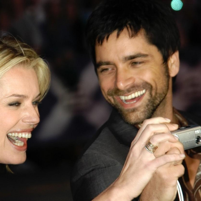 Rebecca Romijn i John Stamos 2003.