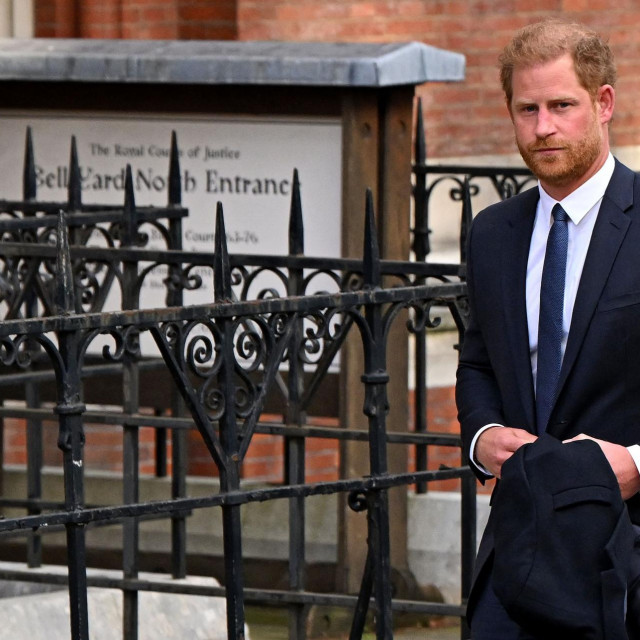 (FILES) Britain‘s Prince Harry, Duke of Sussex leaves from the Royal Courts of Justice, Britain‘s High Court, in central London on March 27, 2023. Lawyers for Prince Harry on December 5 began a legal challenge over his security arrangements in the UK, after he quit frontline royal duties and moved to North America. The case about his loss of UK taxpayer-funded protection is the latest in a string of court proceedings initiated by Harry, whose father is King Charles III. (Photo by JUSTIN TALLIS/AFP)
