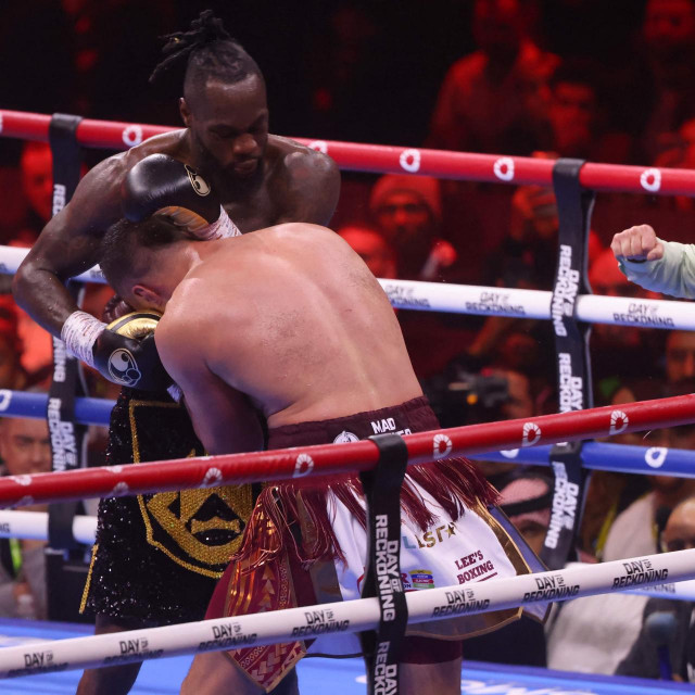 US‘ Deontay Wilder (L) competes with New Zealand‘s Joseph Parker during their heavyweight boxing match at the Kingdom Arena in Riyadh on December 23, 2023. (Photo by Fayez NURELDINE/AFP)
