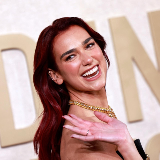 Albanian singer Dua Lipa arrives for the 81st annual Golden Globe Awards at The Beverly Hilton hotel in Beverly Hills, California, on January 7, 2024. (Photo by Michael TRAN/AFP)