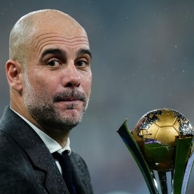 RESTRICTED TO EDITORIAL USE
Mandatory Credit: Photo by Jose Breton/NurPhoto/Shutterstock (14270840h)
Pep Guardiola head coach of Manchester City celebrates with the trophy after winning the final of the FIFA Club World Cup Saudi Arabia 2023 between Manchester City and Fluminense at the King Abdullah Sports City on 22 December 2023 in Jeddah, Saudi Arabia.
Manchester City v Fluminense: Final - FIFA Club World Cup Saudi Arabia 2023, Jeddah - 23 Dec 2023