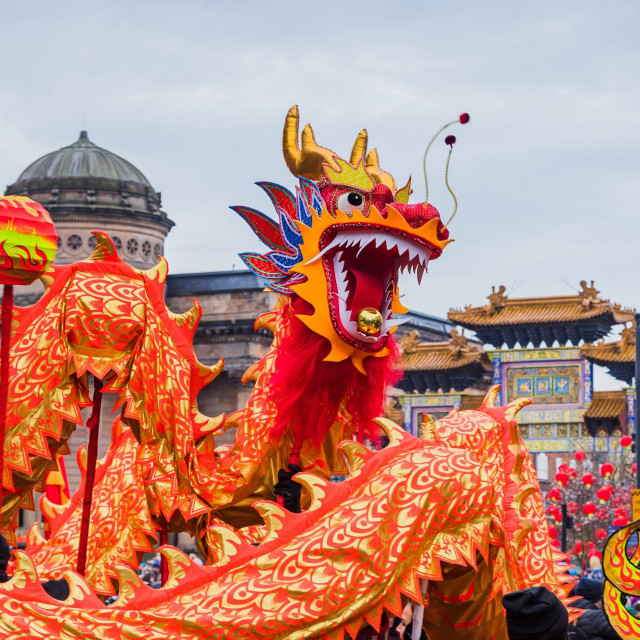 Close up of the beautifully decorated dragon performing its traditional Chinese New Year dragon dance in Liverpool seen in January 2023.