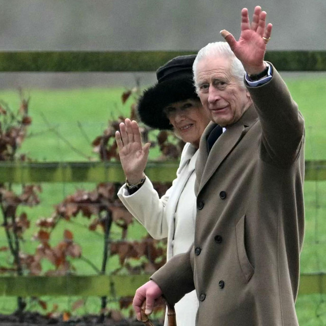 Britain‘s King Charles III and Britain‘s Queen Camilla waves as they leave after attending a service at St Mary Magdalene Church on the Sandringham Estate in eastern England on February 11, 2024. Britain‘s King Charles III on Saturday expressed his ”heartfelt thanks” to well-wishers, in his first statement since his shock announcement that he has cancer. (Photo by JUSTIN TALLIS/AFP)