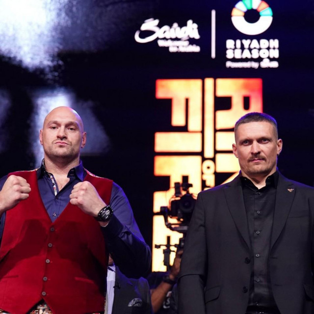 Tyson Fury (lijevo) i Oleksandr Usyk (desno)