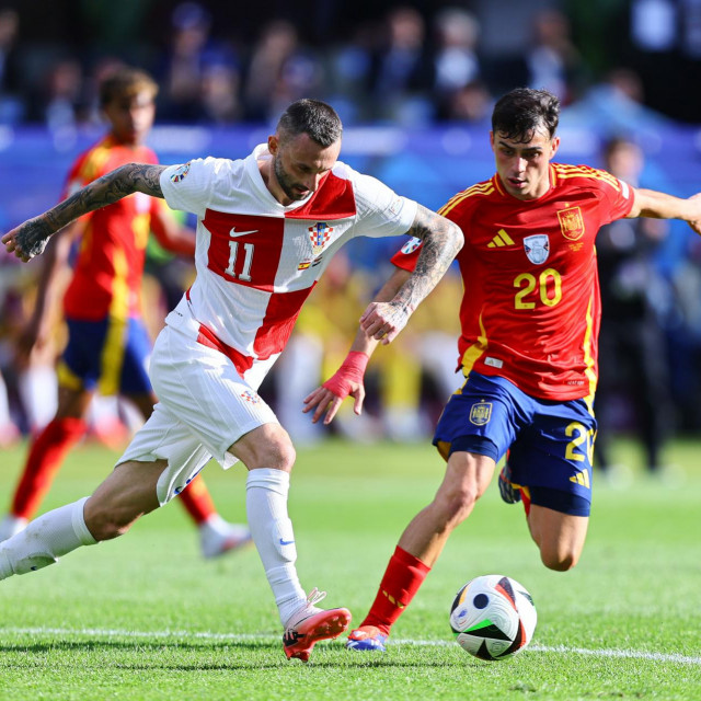 Brozović u akciji protiv Španjolske