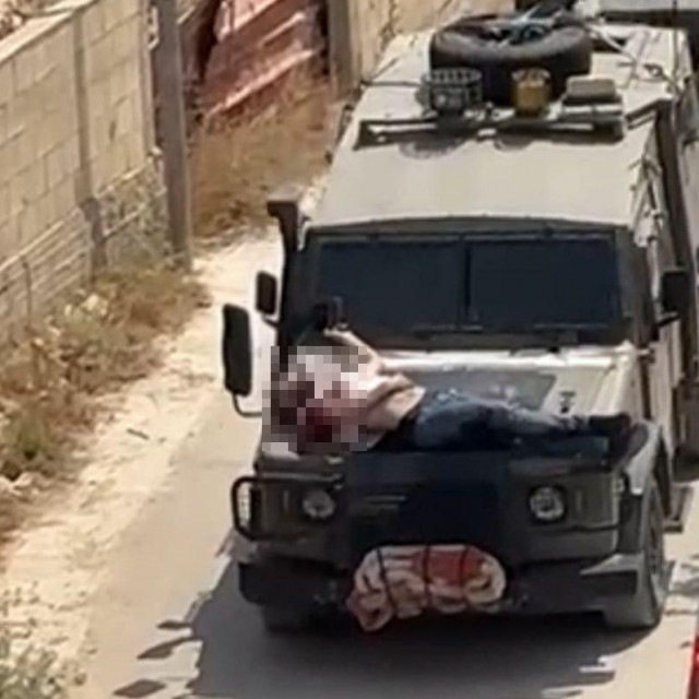 Mudžaheda Azmija Izraelci su zavezali za haubu džipa