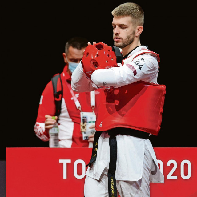 Tokio, 04.09.2021 - Hrvatski sportaᅤᄀ Ivan Mikuliᅣヌ tijekom meᅣヘa ᅣヘetvrtfinala natjecanja u paratekvandou u kategoriji K44 75+ kg protiv Rachida Ismailia Alaouia iz Maroka..foto HINA/ Da