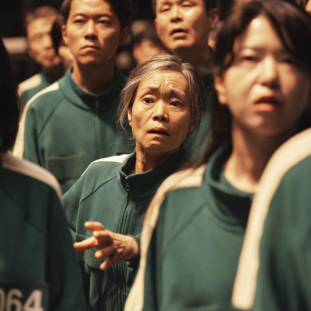 SQUID GAME, KANG Ae-sim (center), (Season 2, ep. 203, aired Dec. 26, 2024). photo: NO Ju-han/?Netflix/Courtesy Everett Collection