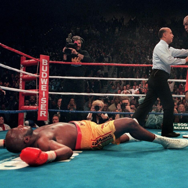 Michael Moorer (lijevo) vs. George Foreman (desno)