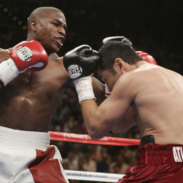 Floyd Mayweather Jr. (lijevo) vs. Oscar De La Hoya (desno)