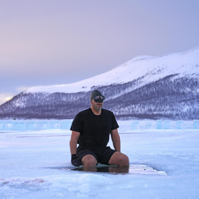 David Blaine prepares to dive under the ice in Finland. (credit: National Geographic/Dana Hayes)