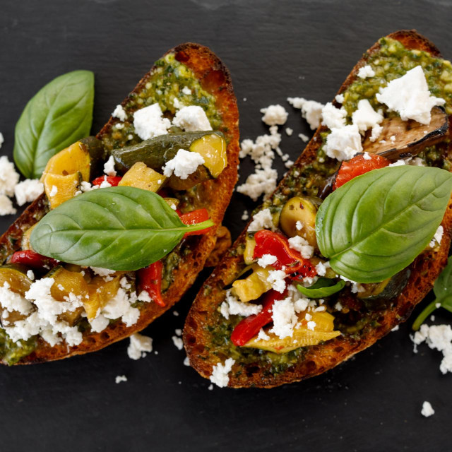 Bruschetta with heirloom tomato, goats cheese, basil and extra virgin olive oil
