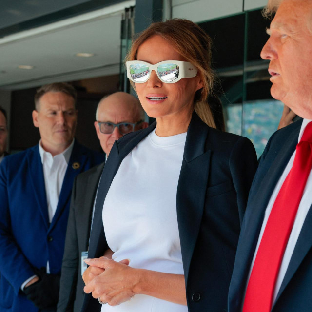 EAST RUTHERFORD, NEW JERSEY - JULY 13: U.S. President Donald Trump and first lady Melania Trump join FIFA President Gianni Infantino greet fans before watching the final match of the FIFA Club World Cup at MetLife Stadium on July 13, 2025 in East Rutherford, New Jersey. This is the first time in the history of the FIFA CWC that the United States has hosted the competition, one year before the U.S., Mexico and Canada are scheduled to host the World Cup in 2026. (Photo by CHIP SOMODEVILLA/GETTY IMAGES NORTH AMERICA/Getty Images via AFP)
