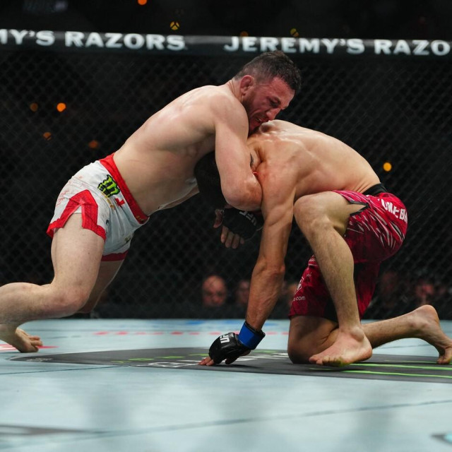 Merab Dvališvili (lijevo) vs. Umar Nurmagomedov (desno)