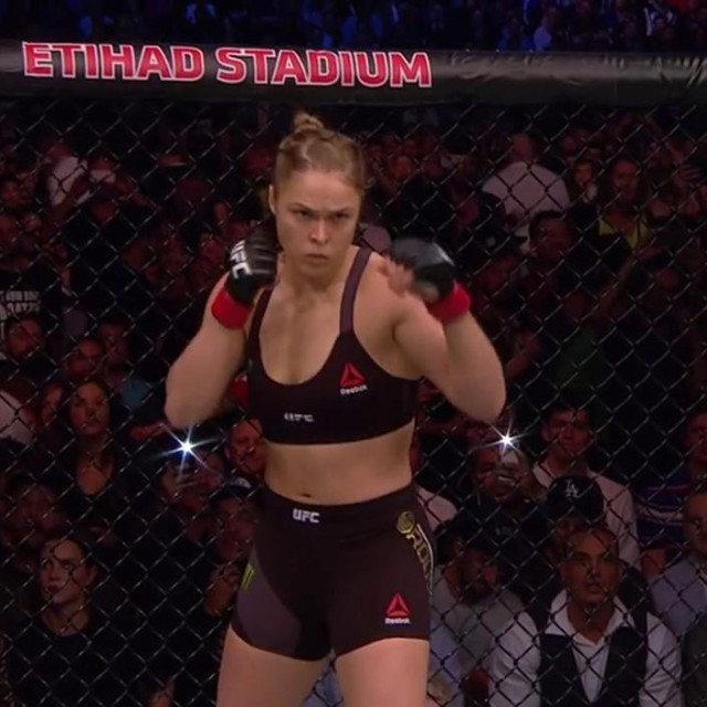16 November 2015 - MELBOURNE - AUSTRALIA

**** STRICTLY NOT AVAILABLE FOR USA USAGE ***

ACTRESS/MMA FIGHTER AND UNDEFEATED WOMEN‘S BANTAMWEIGHT CHAMPION RONDA ROUSEY IS KNOCKED OUT BY 20 TO 1 UNDERDOG HOLLY HOLM AT UFC 193 IN MELBOURNE AUSTRALIA. RONDA ROUSEY HAD BEEN LAUDED AS THE GREATEST FEMALE FIGHTER EVER, BUT WAS KNOCKED OUT BY A HEAD KICK FROM HOLLY HOLM IN THE SECOND ROUND OF THEIR CHAMPIONSHIP FIGHT.,Image: 266469839, License: Rights-managed, Restrictions: PLEASE CREDIT AS PER BYLINE *UK CLIENTS - PLEASE PIXELATE CHILDS FACE PRIOR TO PUBLICATION* UK CLIENTS MUST CALL PRIOR TO TV OR ONLINE USAGE 44 208 370 0291, Model Release: no, Pictured: RONDA ROUSEY - HOLLY HOLM, Credit line: BAR/Backgrid UK/Profimedia