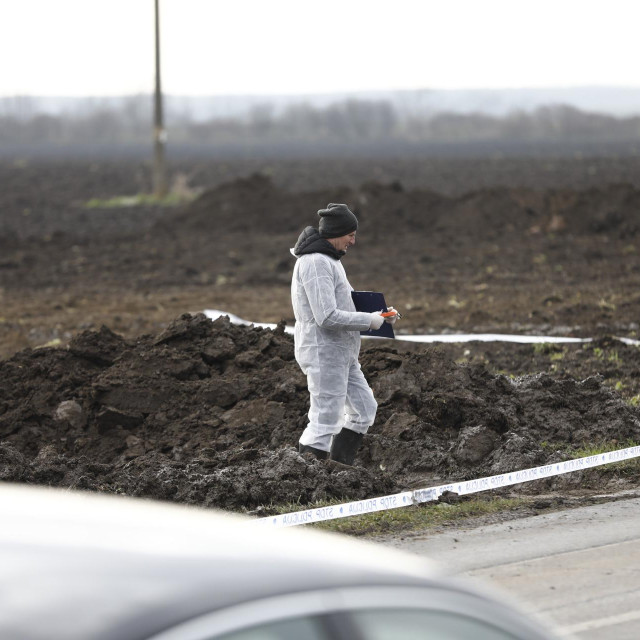 Otkrivanje masovne grobnice; ilustracija
 