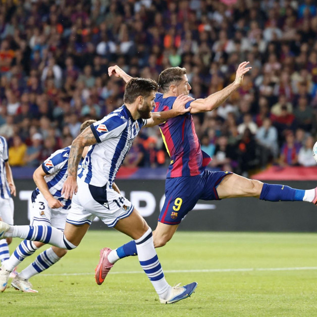 Duje Ćaleta-Car i Robert Lewandowski 