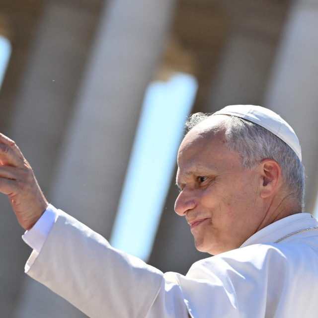Pope Leo XI waves at the audience at the end of the Jubilee mass for the catechist at St. Peters� square in the Vatican on September 28, 2025. (Photo by Alberto PIZZOLI/AFP)
