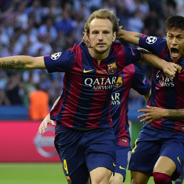 Ivan Rakitić slavi pogodak s Neymarom u finalu Lige prvaka protiv Juventusa 2015. godine