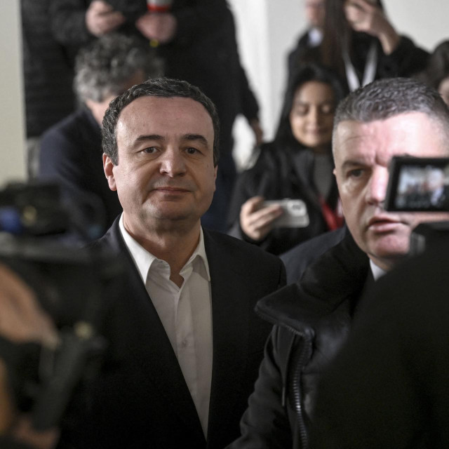 Kosovo‘s Prime Minister Albin Kurti (C) arrives to cast his vote at a polling station during the legislative elections, in Pristina on February 9, 2025. Voters began casting ballots in Kosovo elections Sunday in a contest that pits combative incumbent Prime Minister Albin Kurti‘s quest to stamp out Serbian influence against a fractured opposition‘s vow to boost the economy. (Photo by Armend NIMANI/AFP)