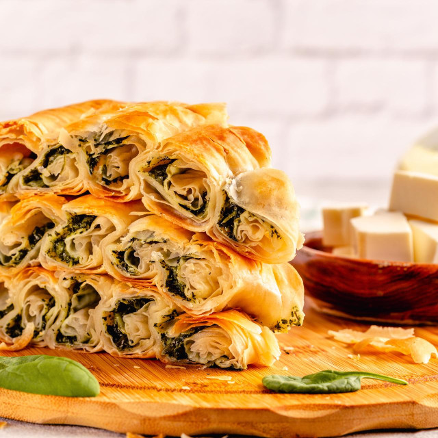 Spanakopita, greek phyllo pastry pie with spinach and feta cheese filling