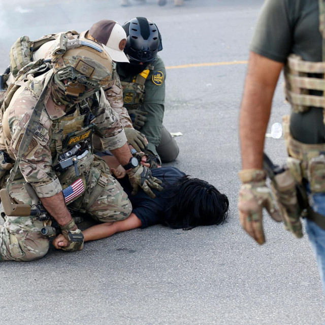 Uhićenje migranta u Chicagu