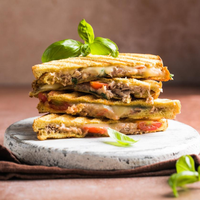 Delicious sandwiches with tuna, tomato and cheese