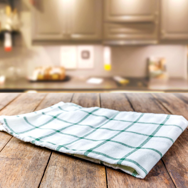 Tablecloth on a wooden desk in the kitchen for display or montage your products