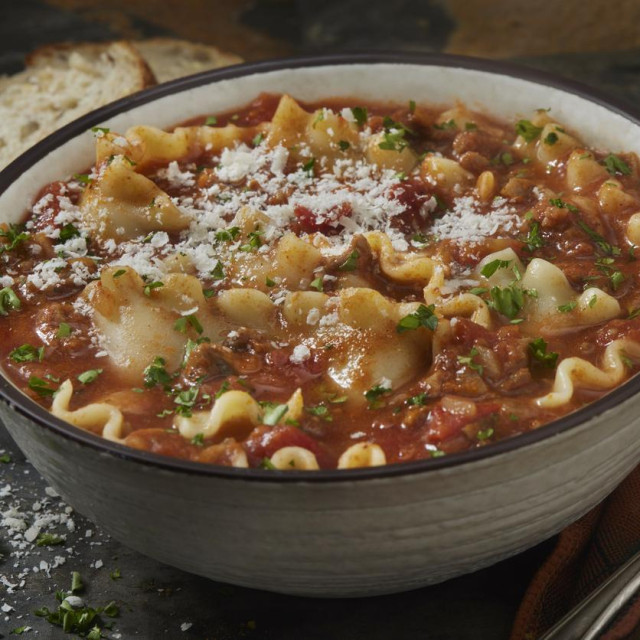Lasagna Soup with Ground Beef, Parmesan Cheese, Fresh Parsley and French Bread