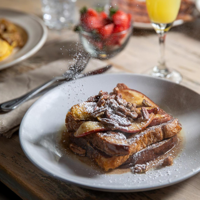 French toast breakfast lightly topped with powdered sugar