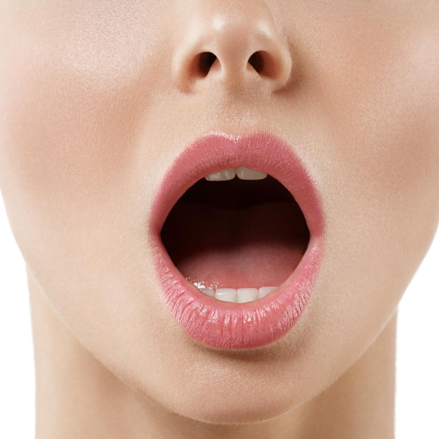 Open mouth woman close up