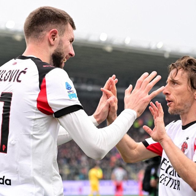 Strahinja Pavlović i Luka Modrić
