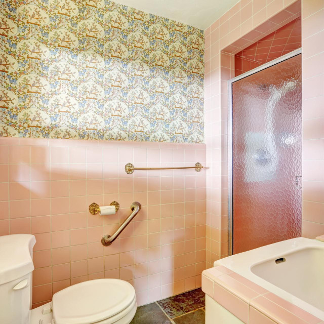 Light pink bathroom in old house. Unique modern old home build in 1952.