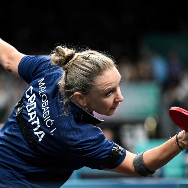 Croatia‘s Ivana Malobabic plays a return to Singapore‘s Zeng Jian during their men‘s table tennis singles round of 64 at the Paris 2024 Olympic Games at the South Paris Arena in Paris on July 28, 2024. (Photo by JUNG Yeon-je/AFP)