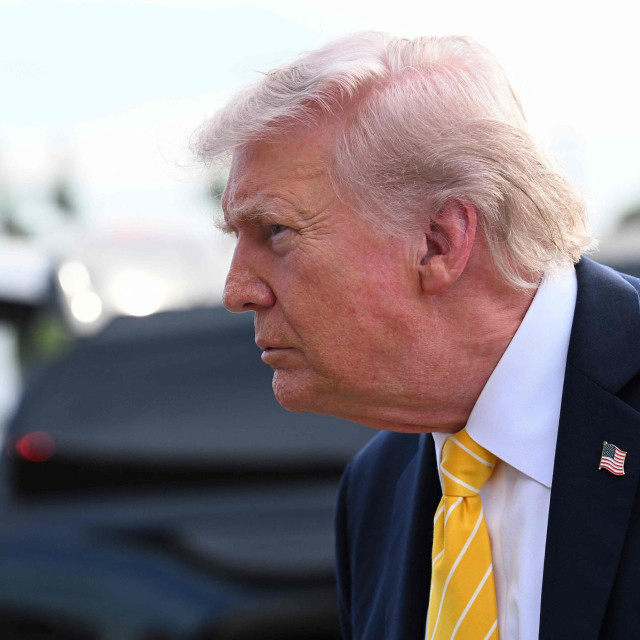 PALM BEACH, FLORIDA - MAY 2: U.S. President Donald Trump speaks to journalists before boarding Air Force One at Palm Beach International Airport on May 2, 2026 in Palm Beach, Florida. Trump is spending the weekend at his Mar-A-Lago resort. Roberto Schmidt/Getty Images/AFP (Photo by ROBERTO SCHMIDT/GETTY IMAGES NORTH AMERICA/Getty Images via AFP)