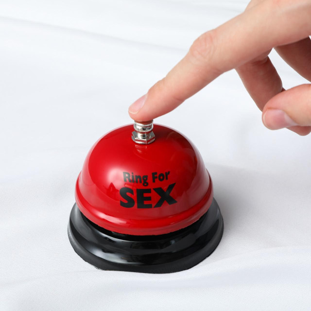 Bell for sex on a light background.