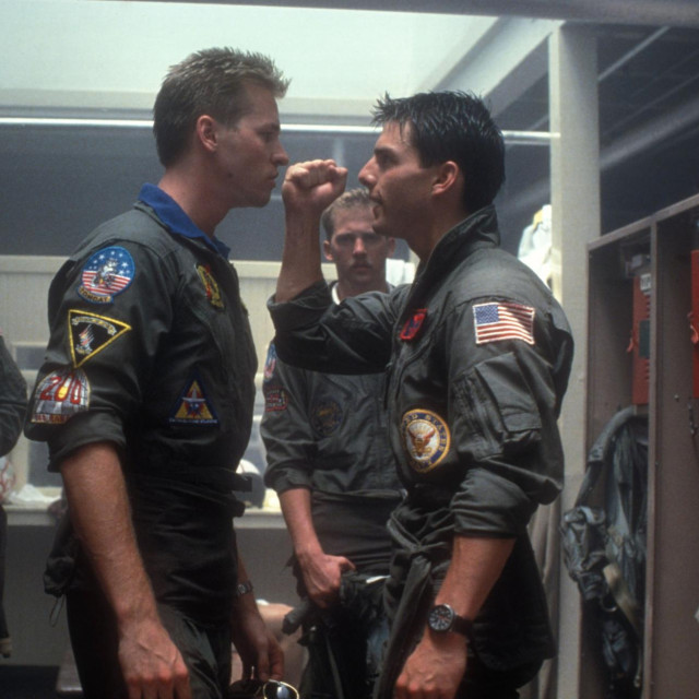 Val Kilmer i Tom Cruise u filmu Top Gun u režiji Tonyja Scotta. 1986.
Paramount
 