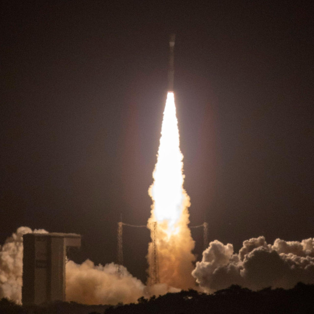 The European Vega-C launcher, operated by Avio, carrying the SMILE (Solar Wind Magnetosphere Ionosphere Link Explorer) satellite on its first flight, launches as part of a mission developed and carried out in collaboration between the ESA and the Chinese Academy of Sciences (CAS) at the Guiana Space Centre in Kourou, on the French overseas department of Guiana, on May 19, 2026. The SMILE satellite, designed to observe solar winds hitting Earth‘s magnetic field, was placed in orbit on May 19, an hour after the mission was launched from the Kourou space center in French Guiana. (Photo by RONAN LIETAR/AFP)